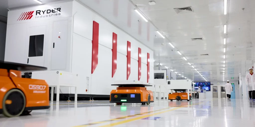 Automated Guided Vehicle operating on a warehouse floor.