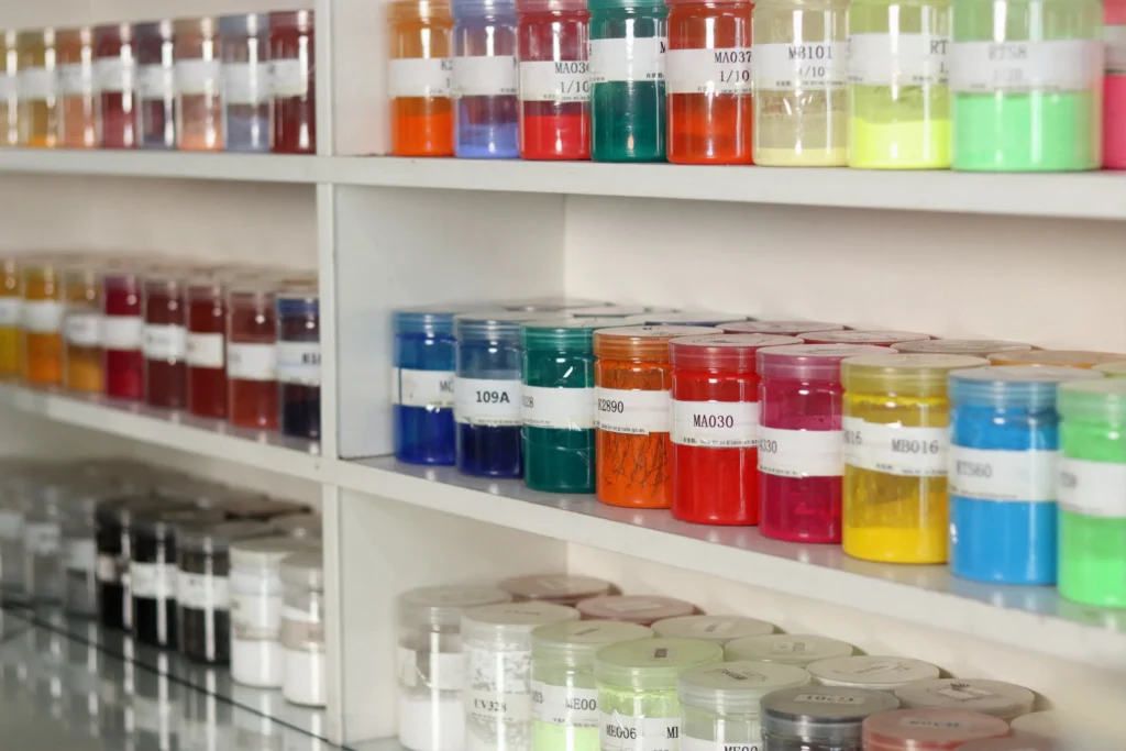 Pigment containers in Ryder lab enabling personalized colour development for plastics manufacturing